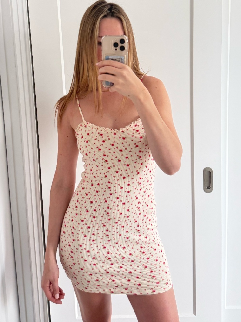 Sleeveless Cream Mini Dress with Red Floral Print